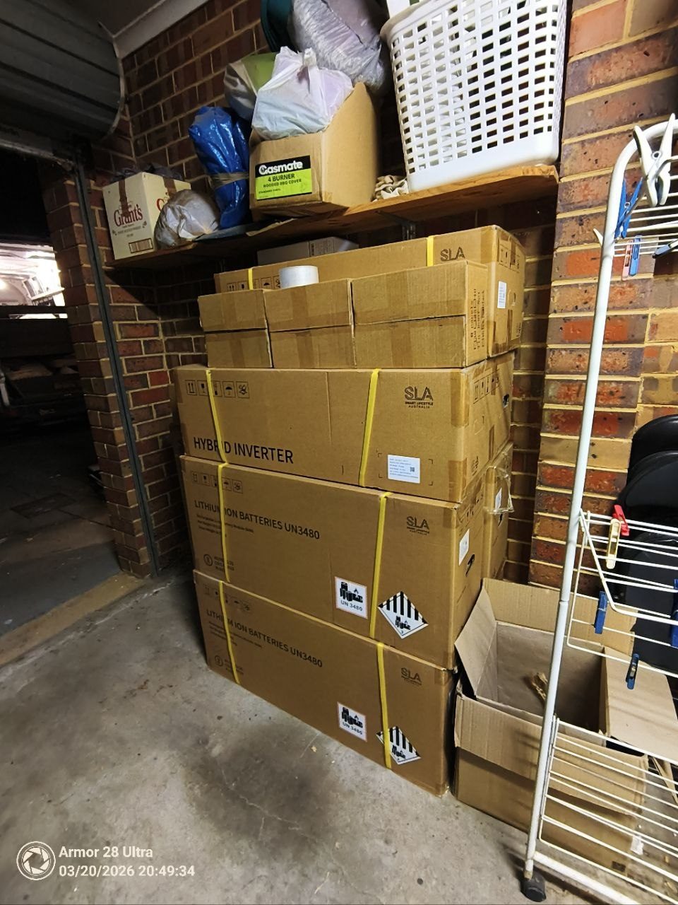 Hybrid inverter and lithium battery pallet delivery stacked in the garage